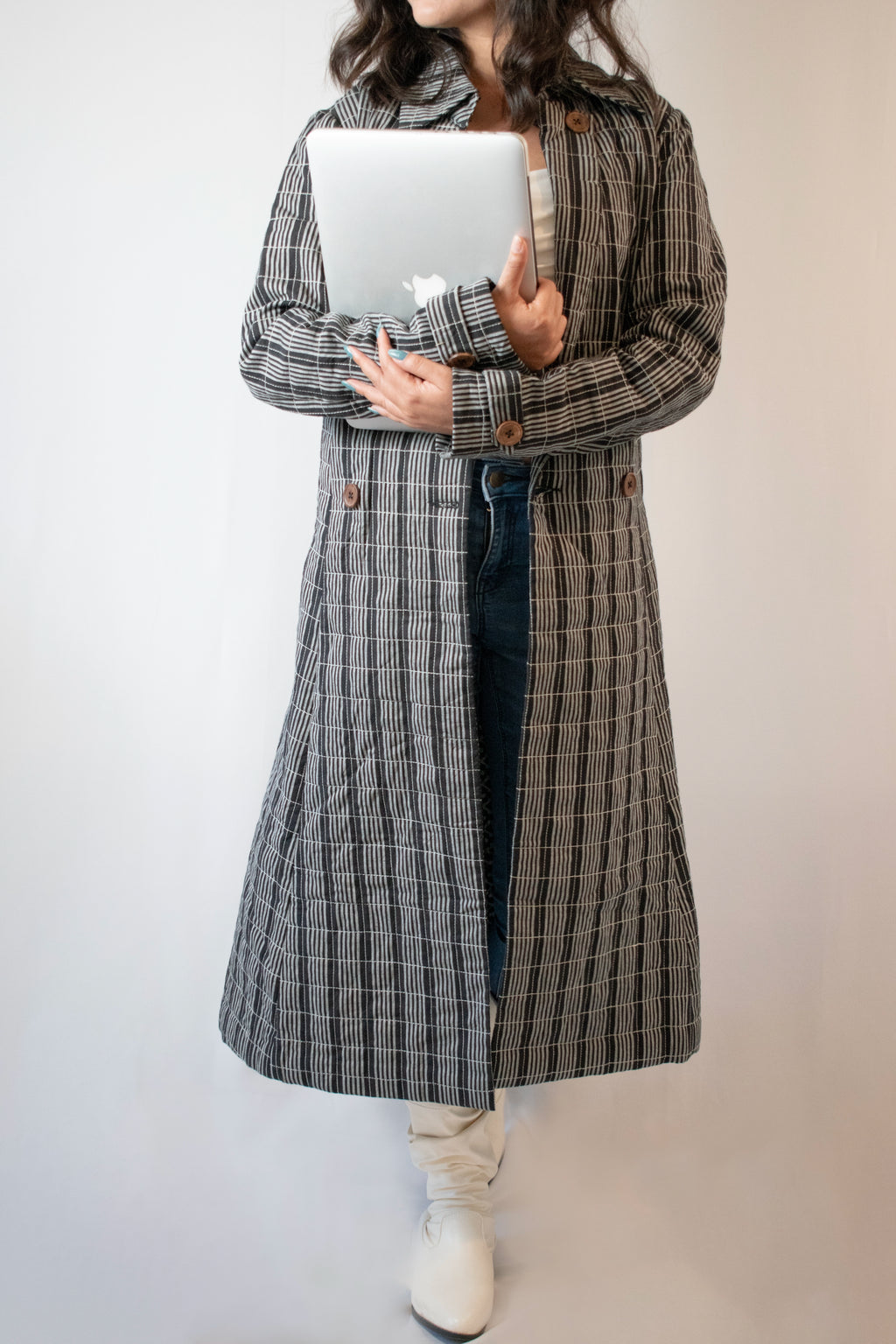 Black and white  long quilted jacket close-up