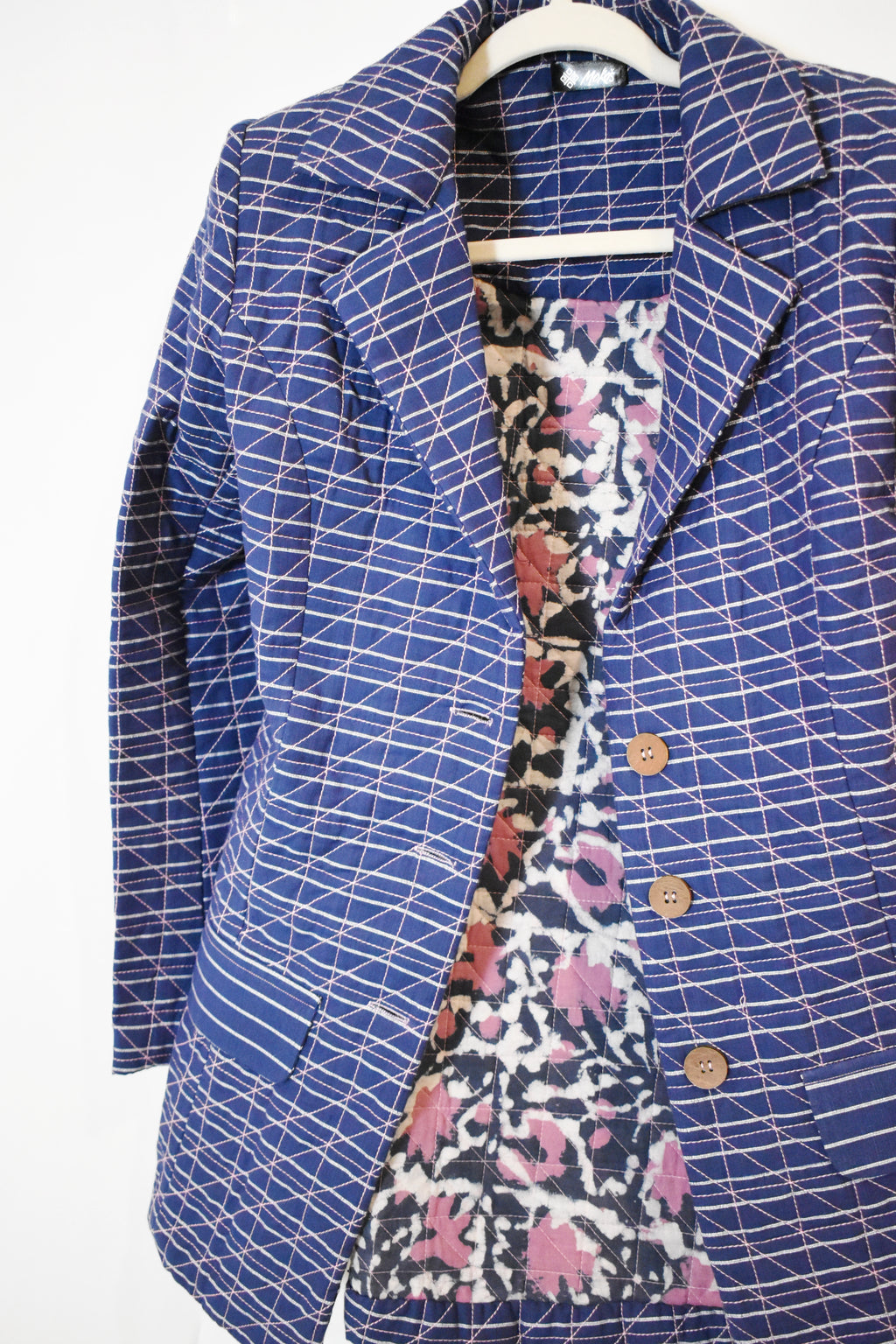 blue quilted jacket
