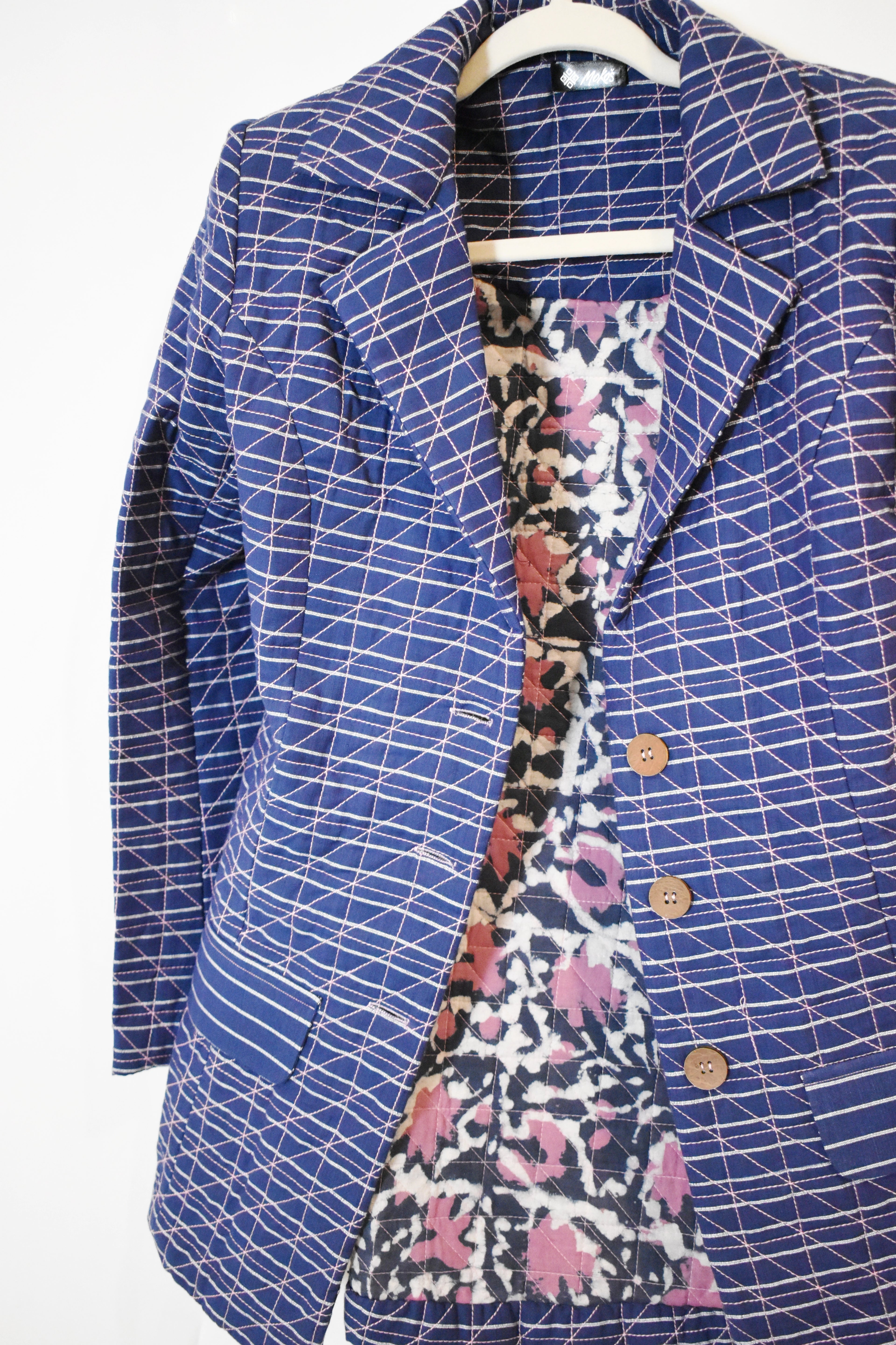 blue quilted jacket