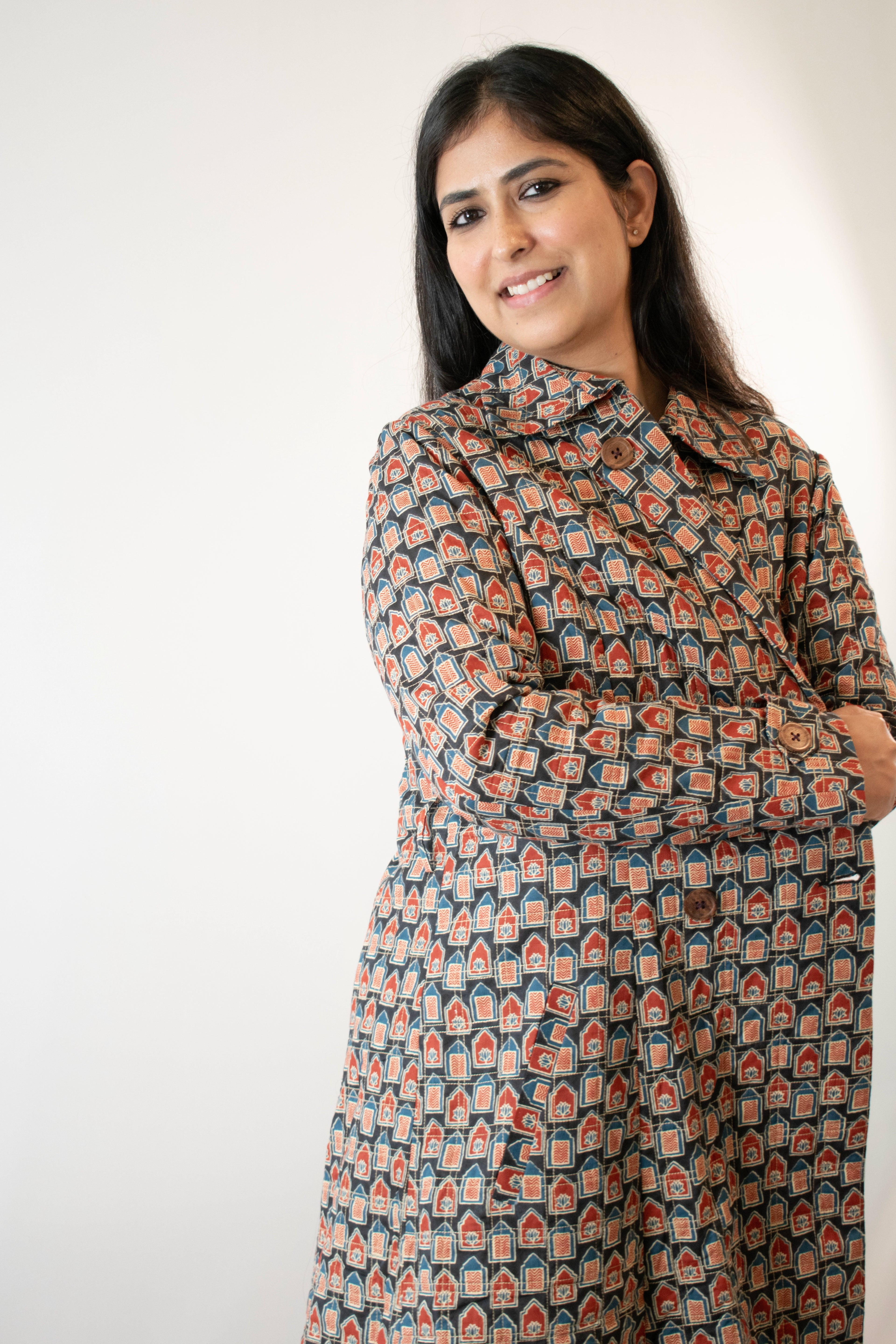 Earthy printed long quilted jacket close image