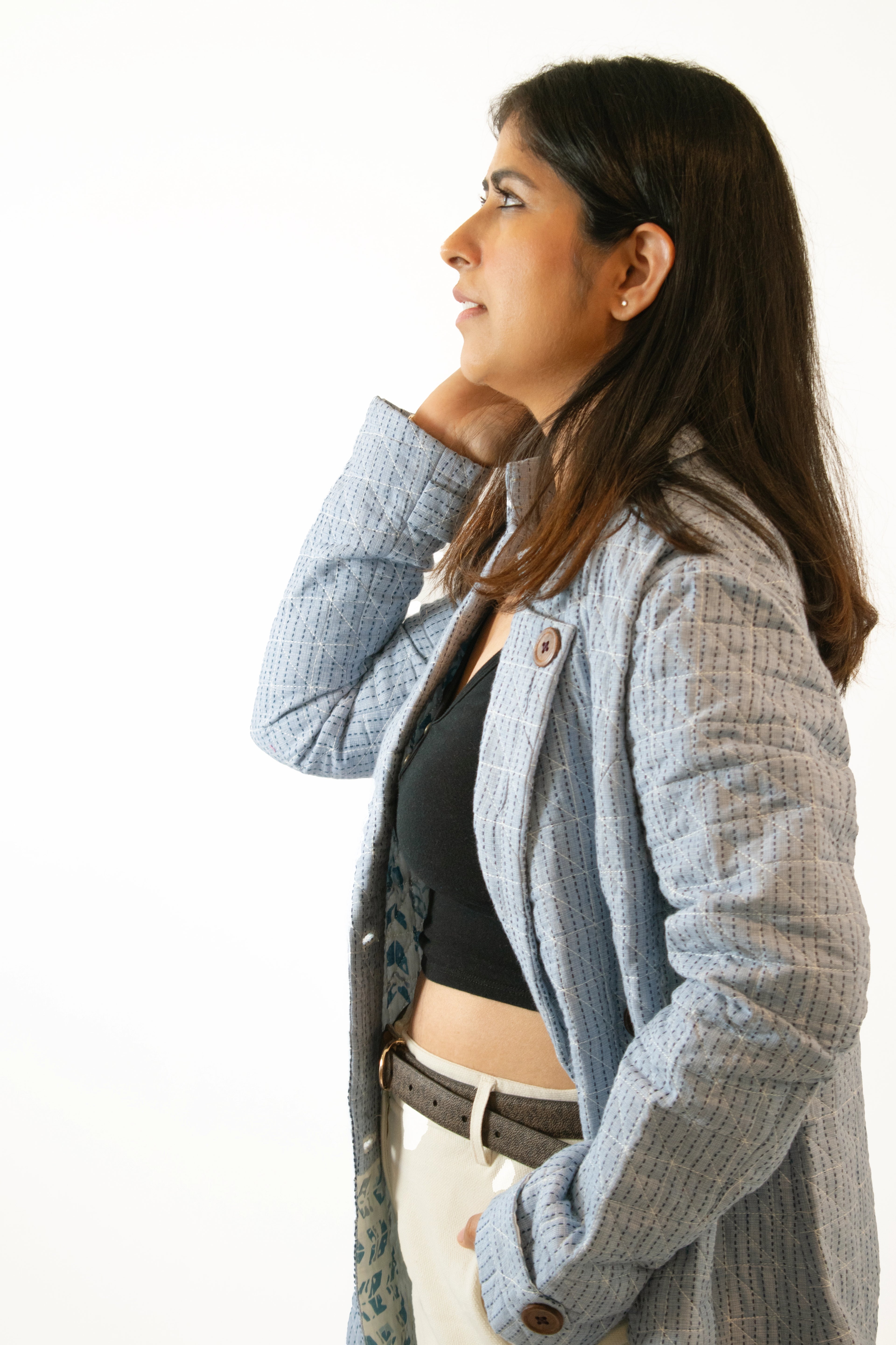 Light blue quilted coat side view