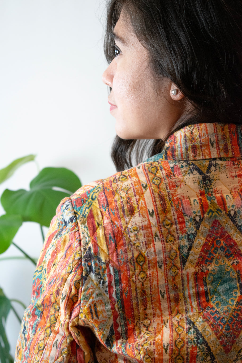 Multicolor quilted jacket close up image