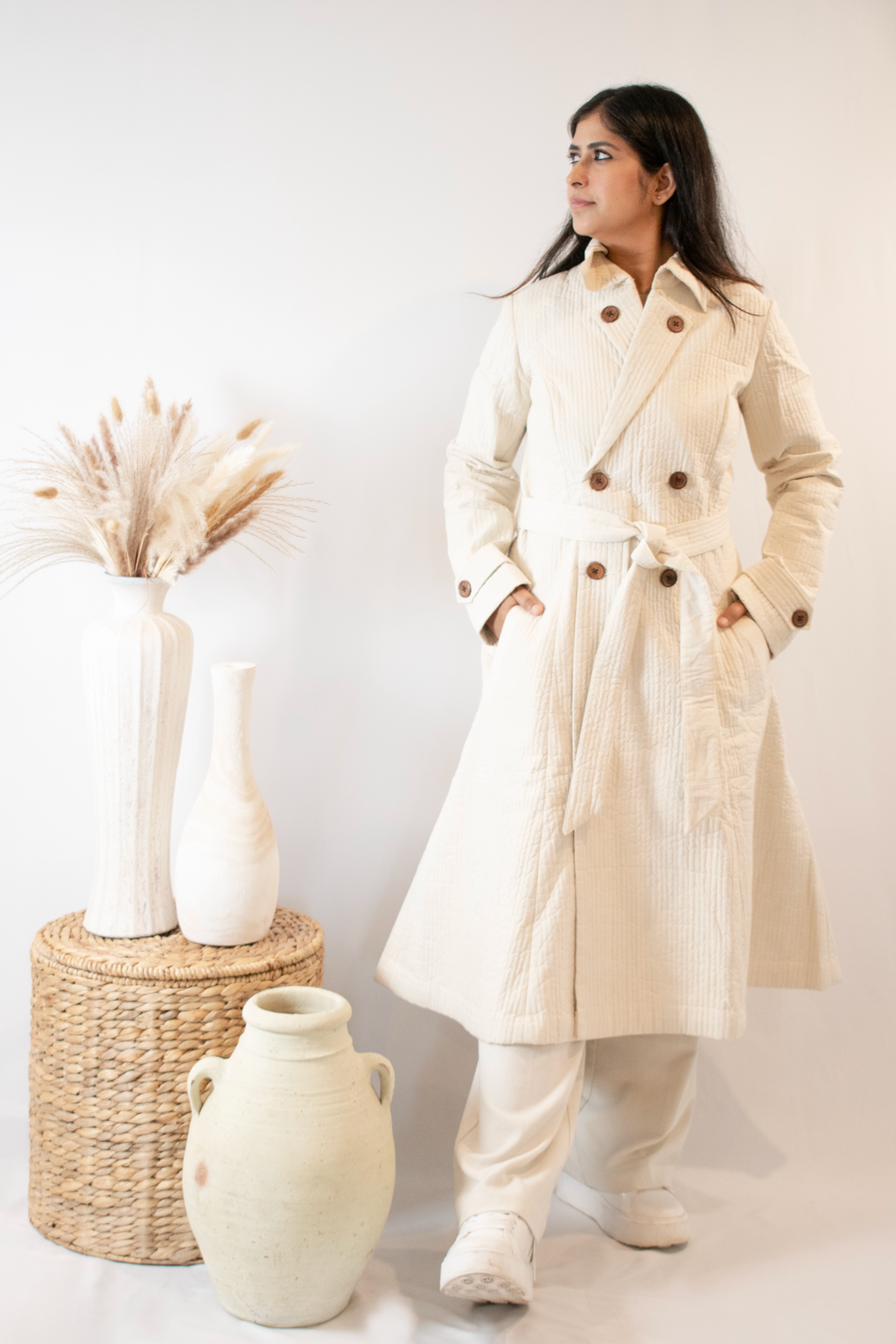 White long quilted jacket front look
